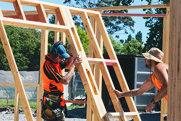 Putting up a timber frame on Brewer Street residential construction