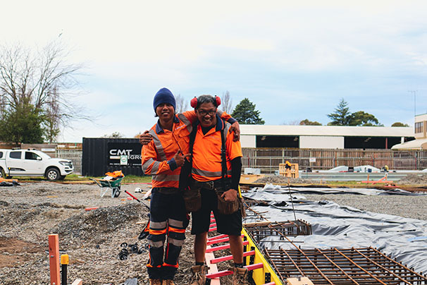 Construction workers at Waters Avenue construction site