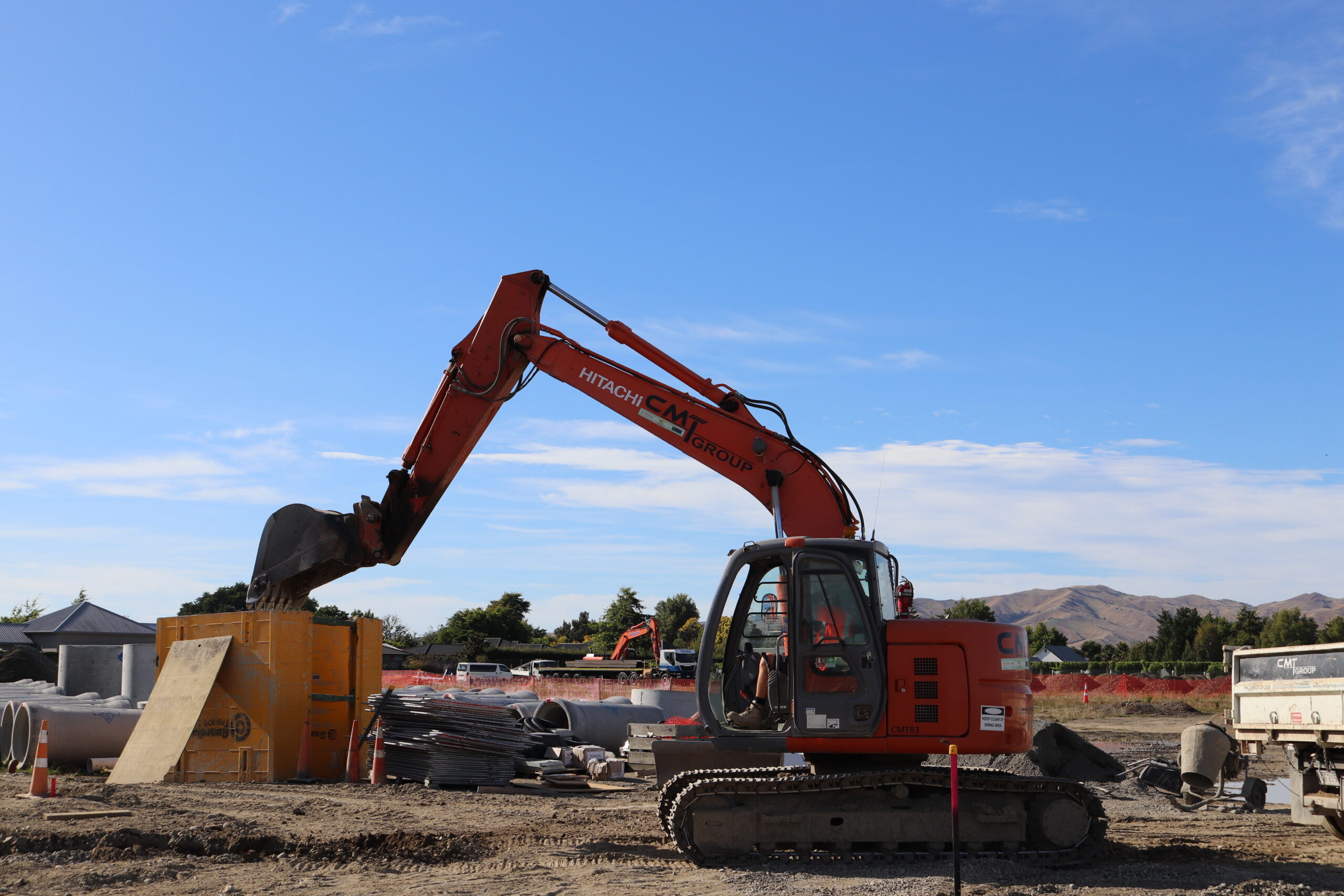 Cameron Reid from CMT group working on the many trenches around the property